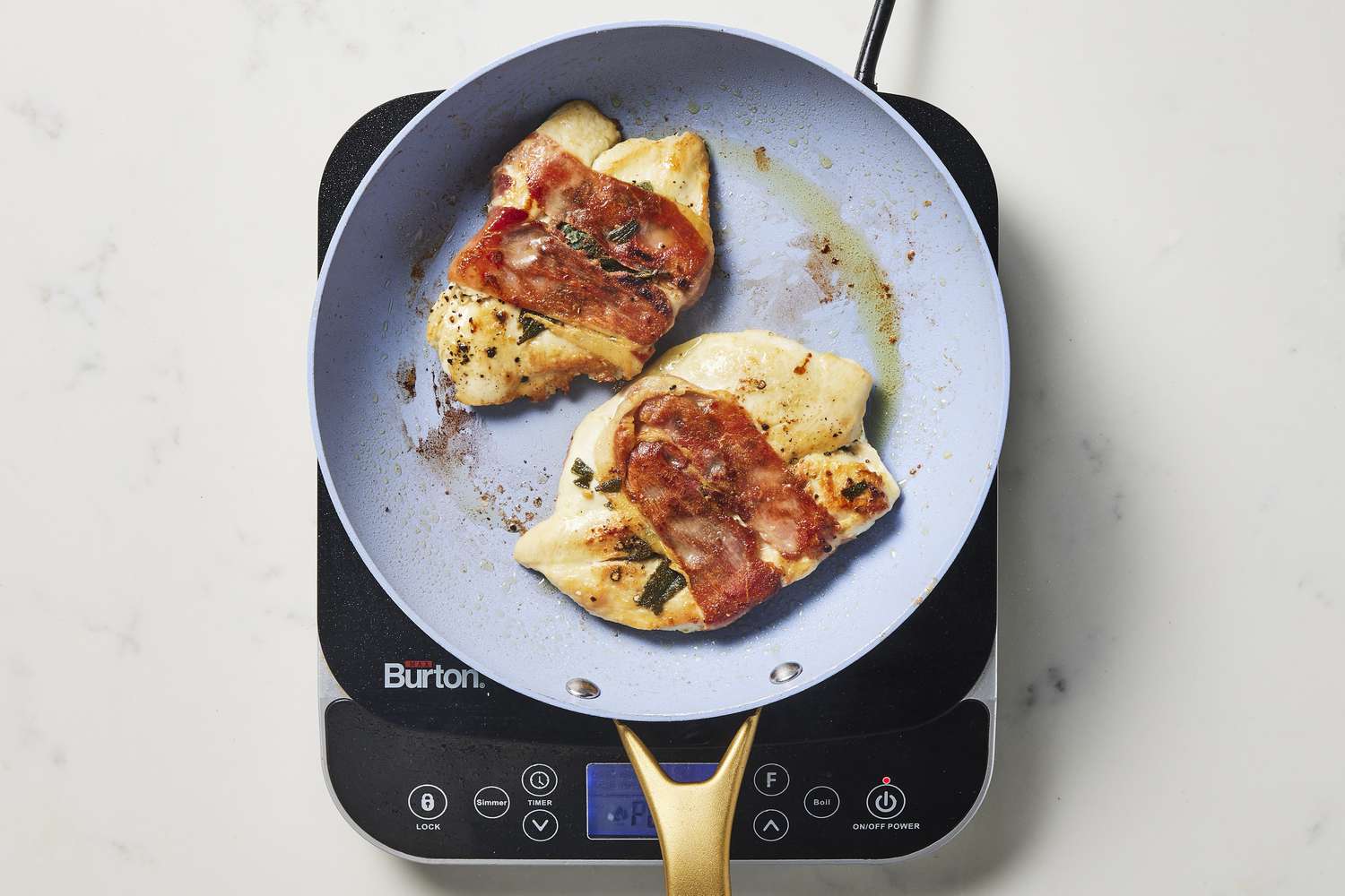 Chicken Saltimbocca cooking in skillet