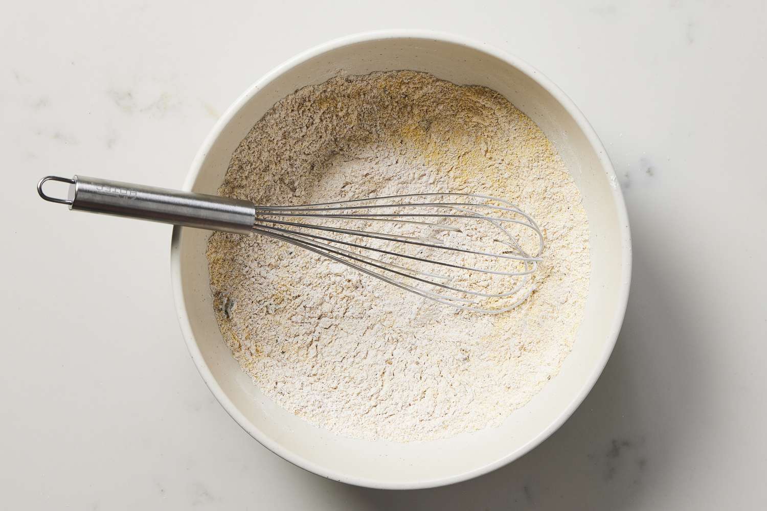 Cornstarch, flour, seasoning in bowl