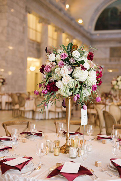 tall centerpiece with hydrangeas and garden roses
