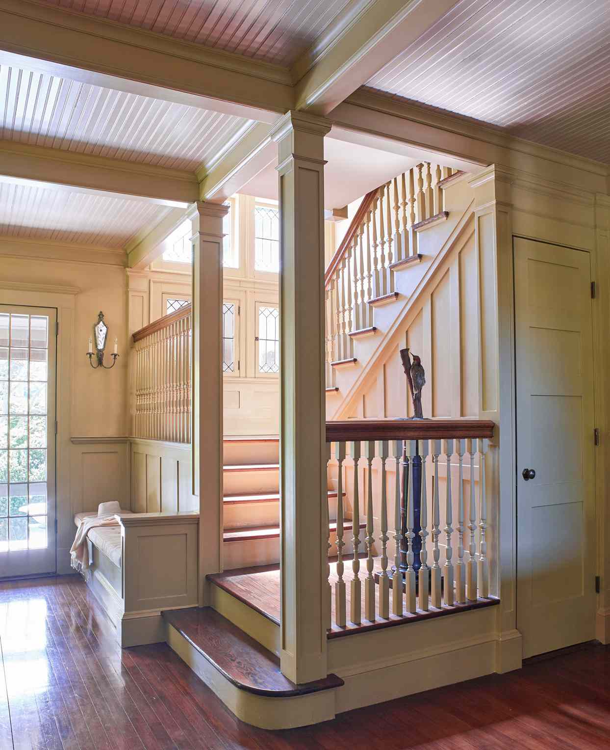 front hall with built-in bench