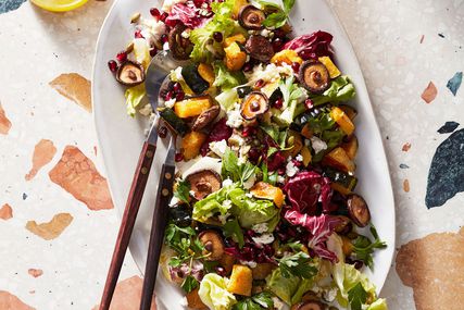 chopped winter salad with mushrooms and pomegranate