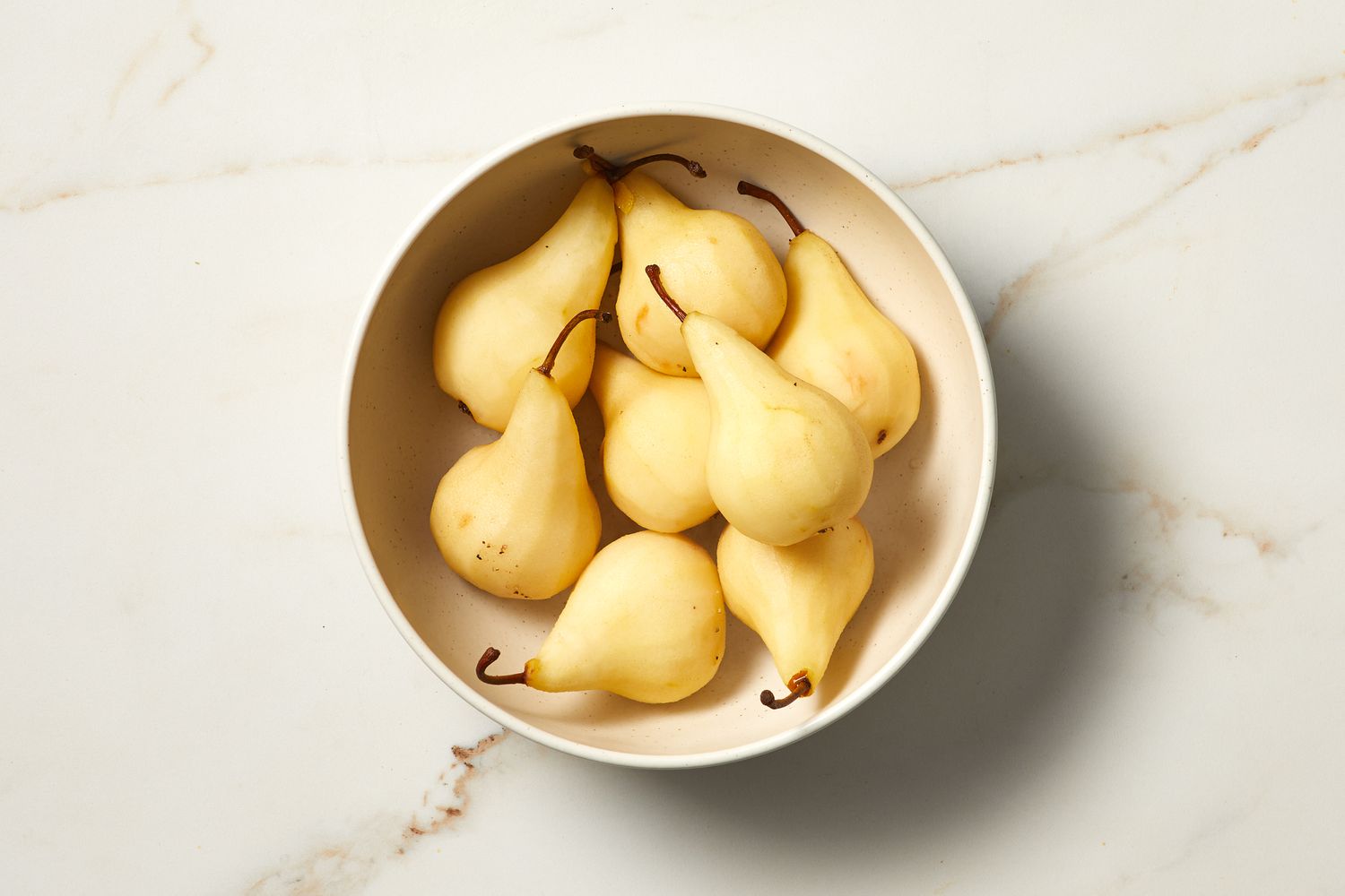 overhead view of pears in a bowl