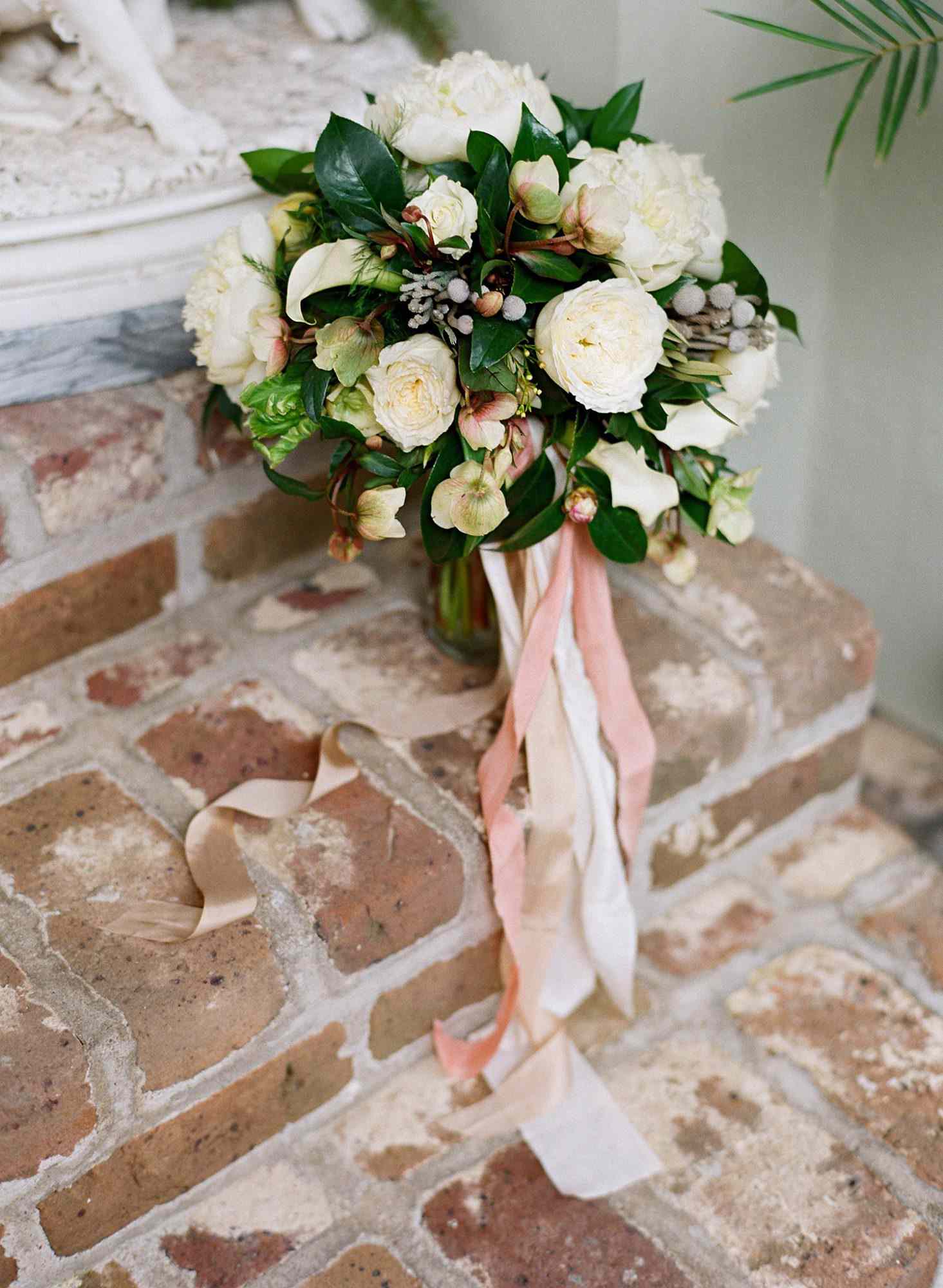 lindsay evan wedding bouquet on steps