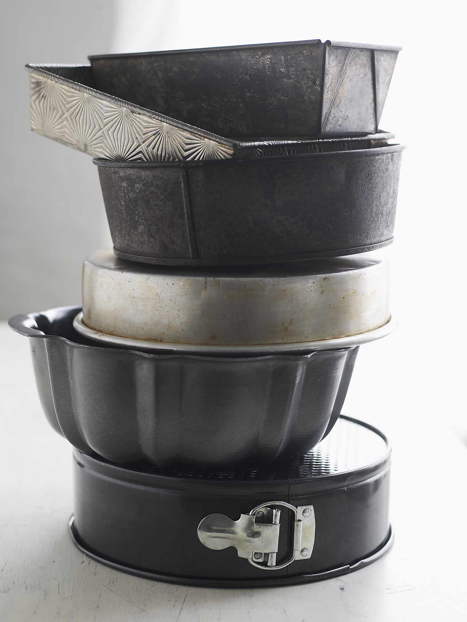 stack of cake pans