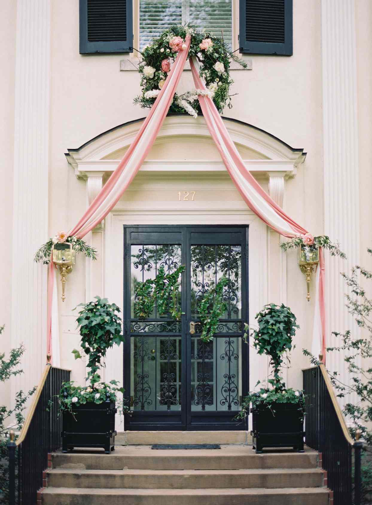 home front step decorating with wreath and drape for wedding