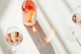 rose wine bottle and glass on table