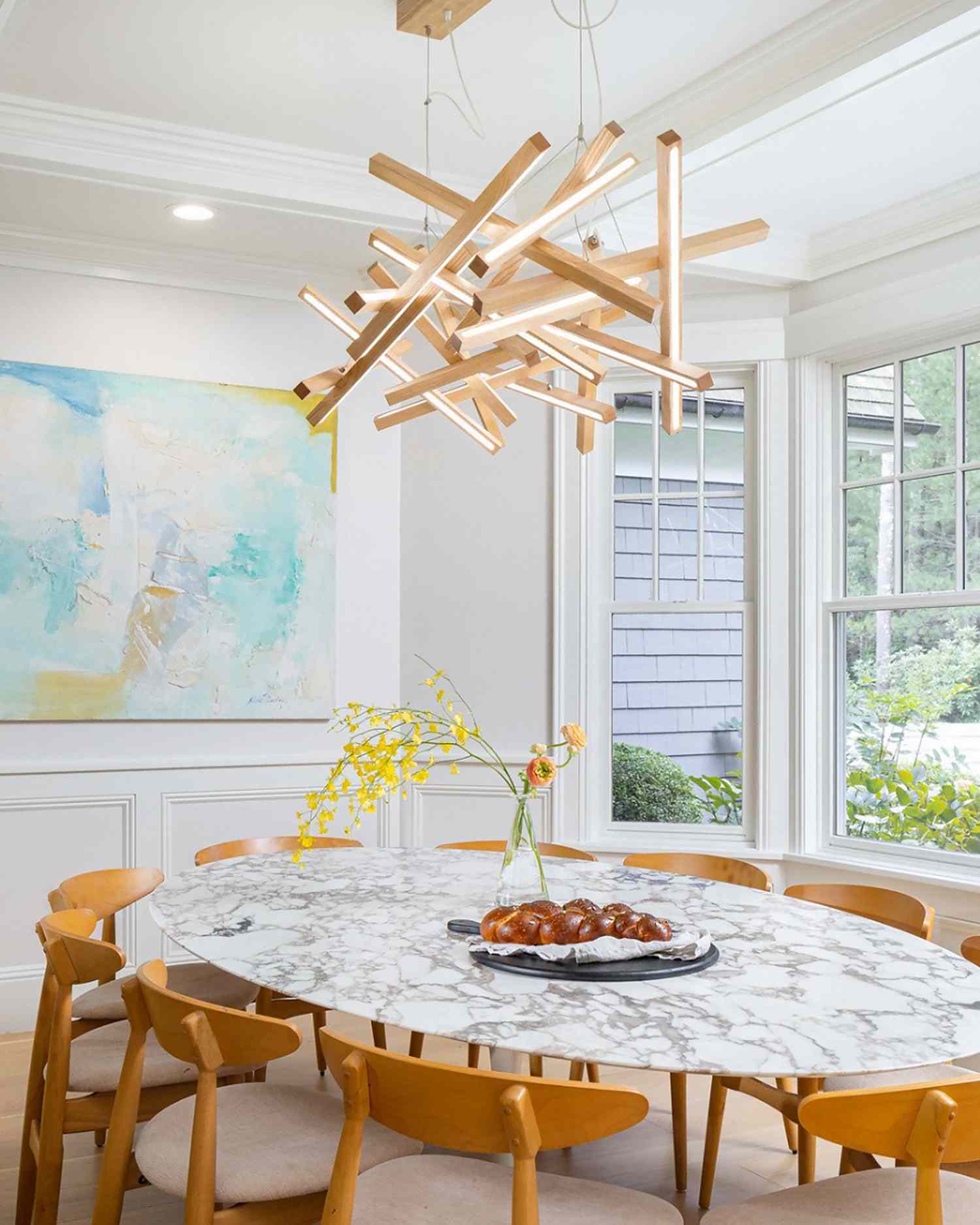 statement chandelier over a dining table