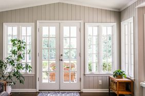 bright, open windows and back door in sun room