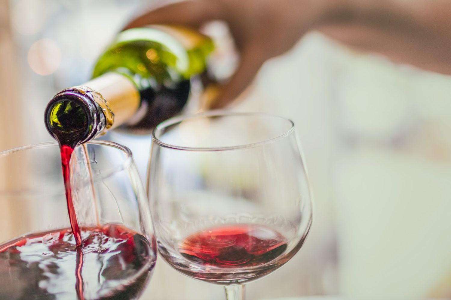 pouring glass of red wine