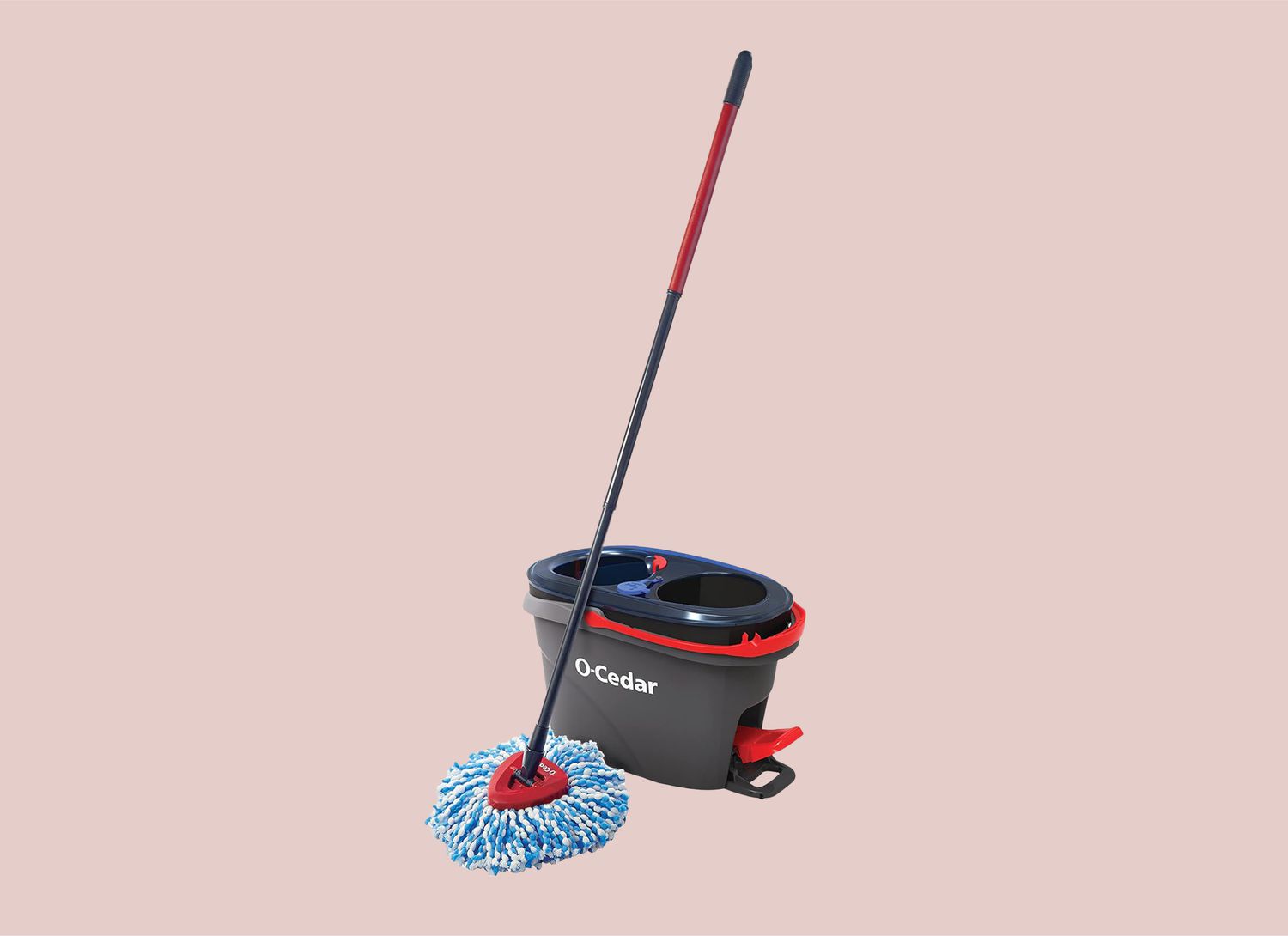 O-Cedar mop and bucket on a pink background
