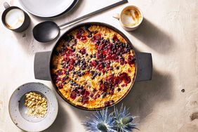 baked oatmeal with berries and seeds in a round pan 