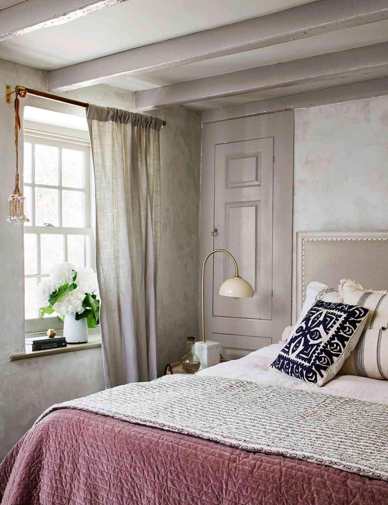 a classic and charming bedroom in Hill's home