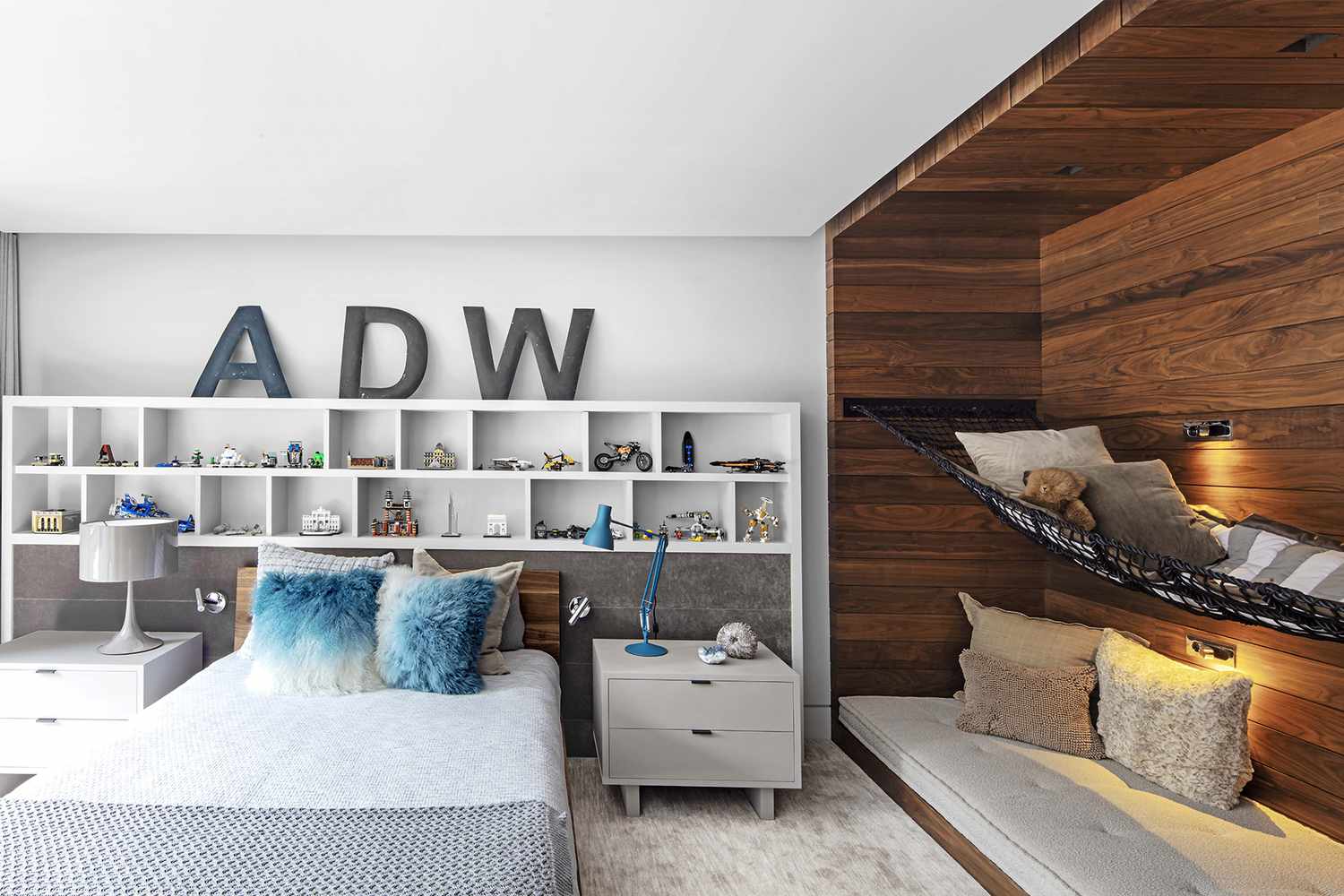 white shelves as headboard in bedroom