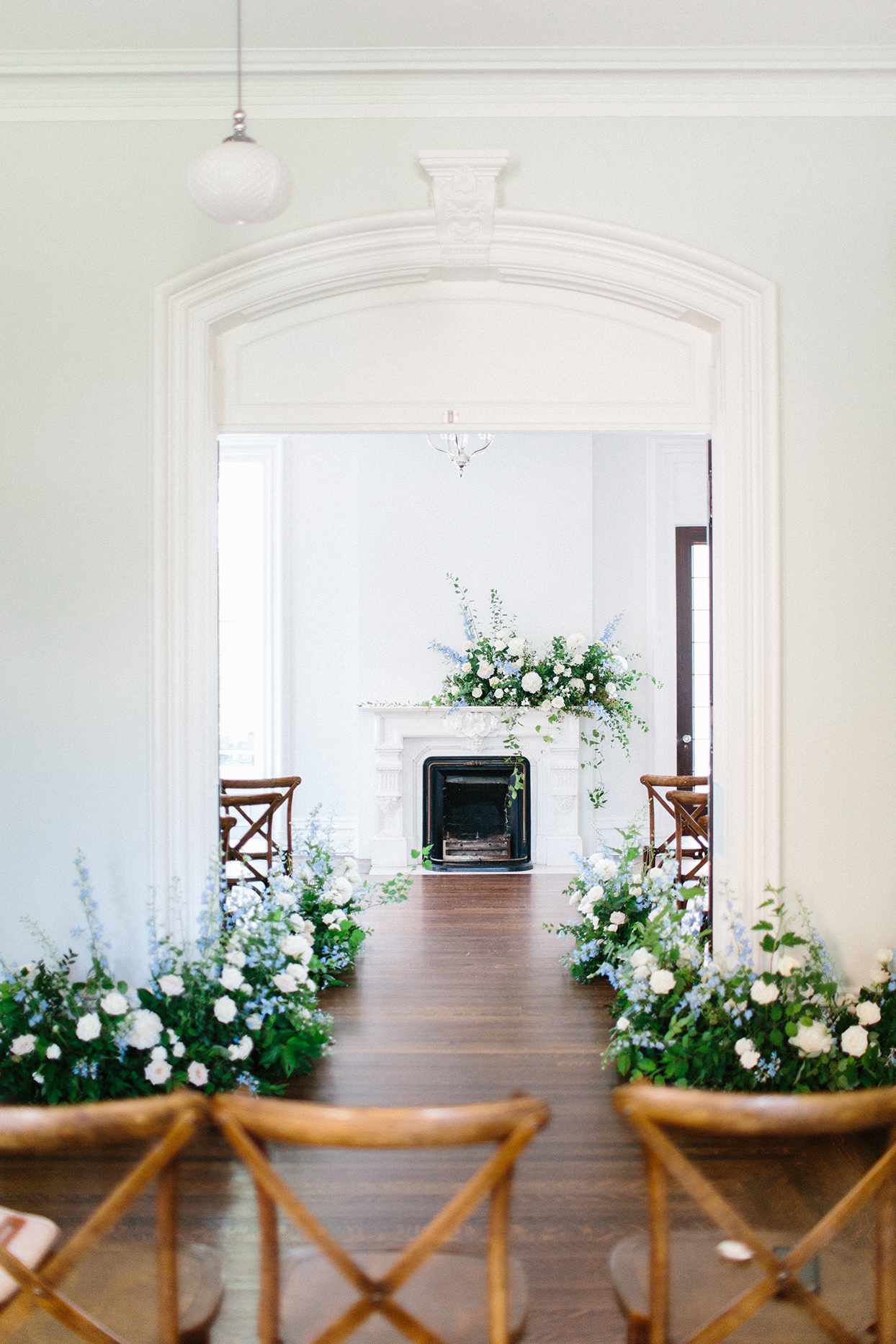 indoor wedding ceremony fireplace area