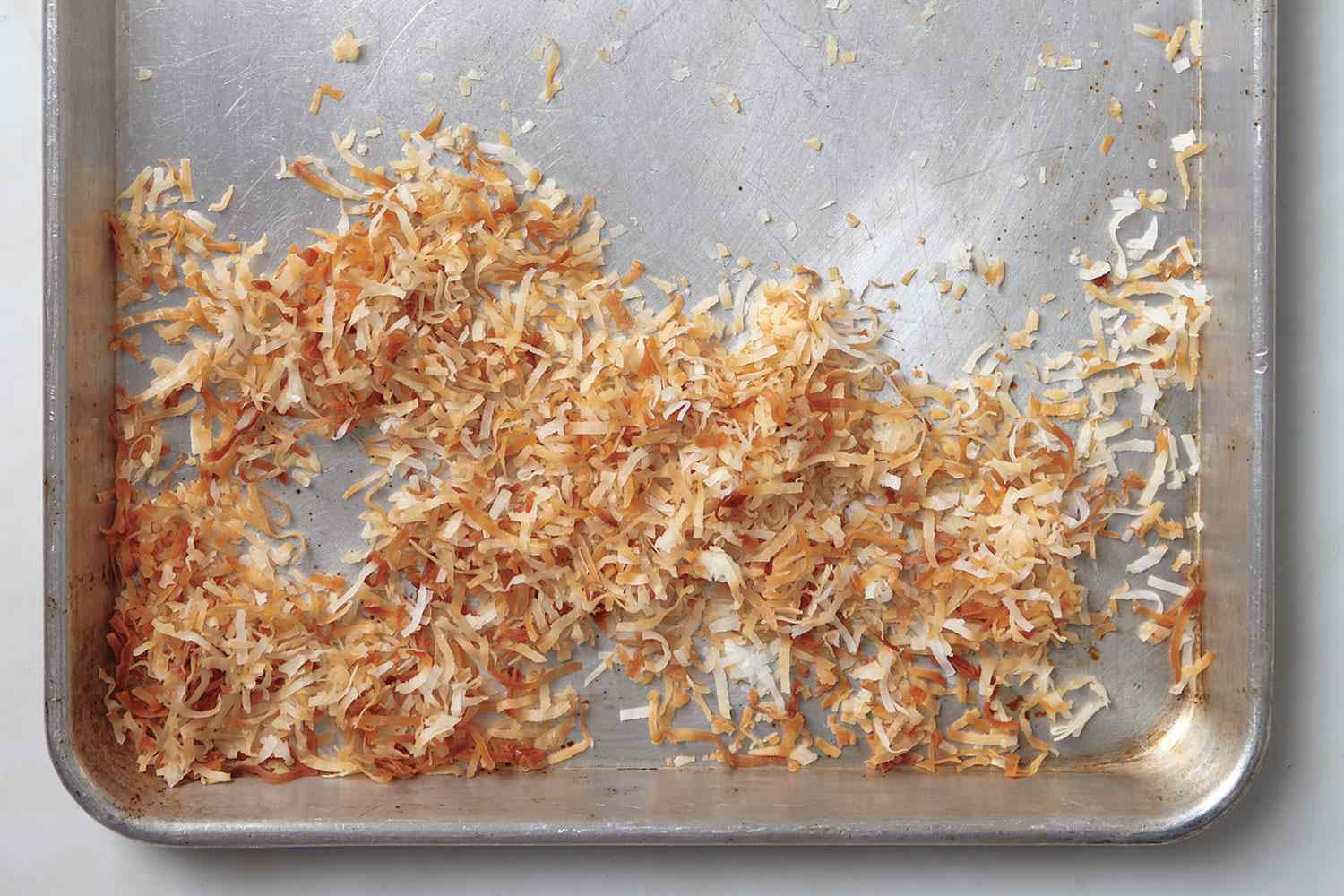 Toasted coconut on baking sheet
