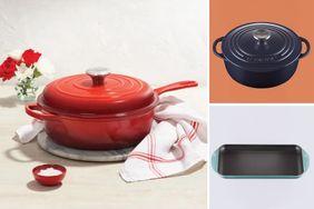 A red Dutch oven on a table with salt and towel a black Dutch oven and a rectangular baking dish