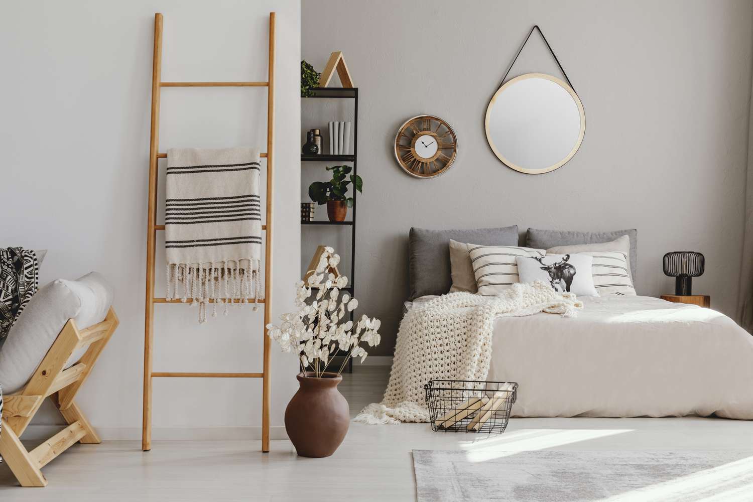 white room with blanket on ladder