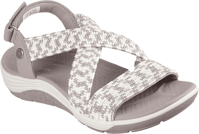 Comfortable strappy sandal with textured top straps and cushioned sole. 