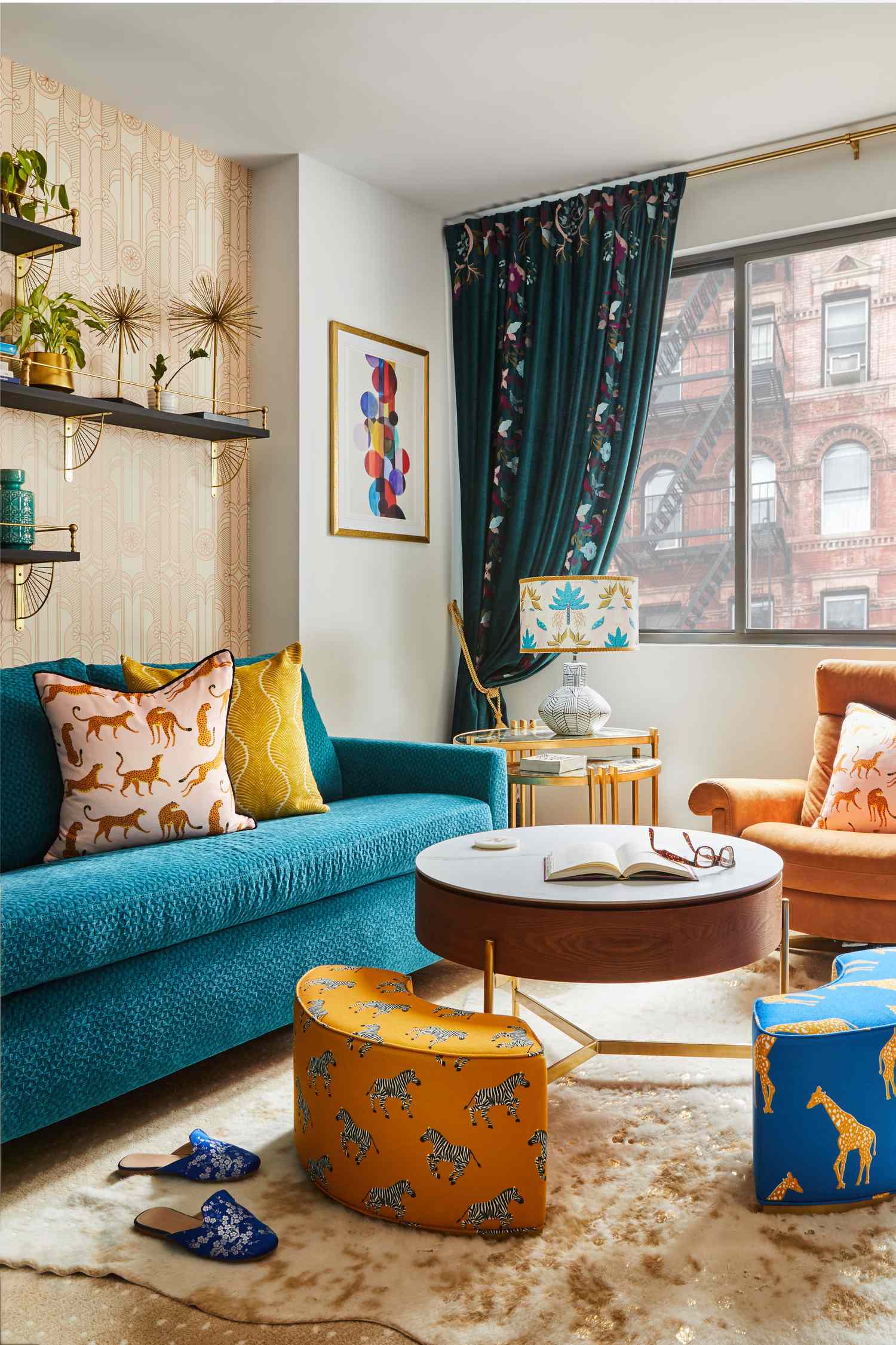 Patterned blue curtains in a living room with tie-backs