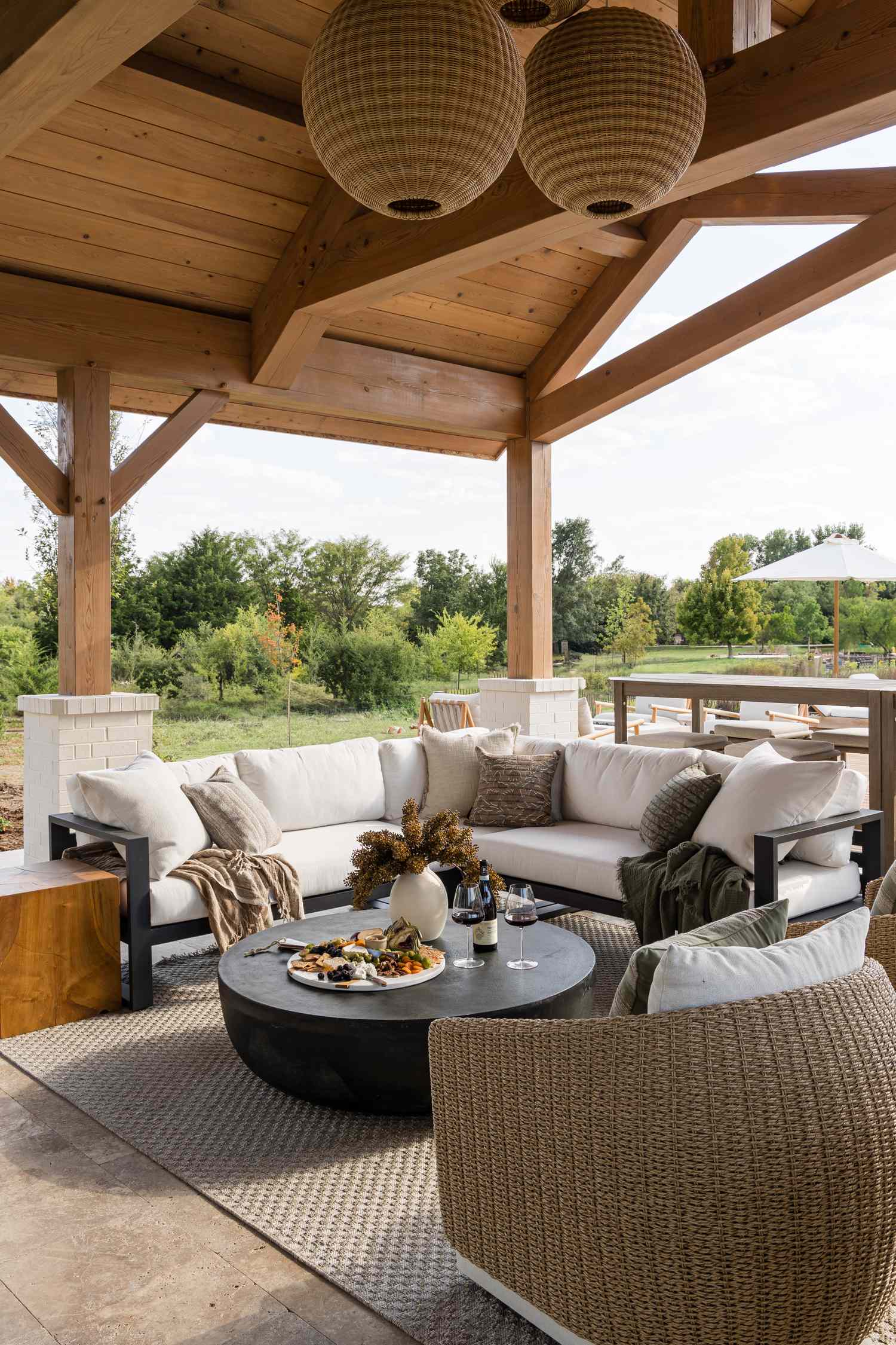 porch with wood shiplap and pendant lighting