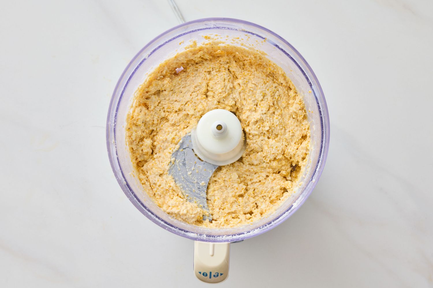 Food processor with doughlike mixture formed inside