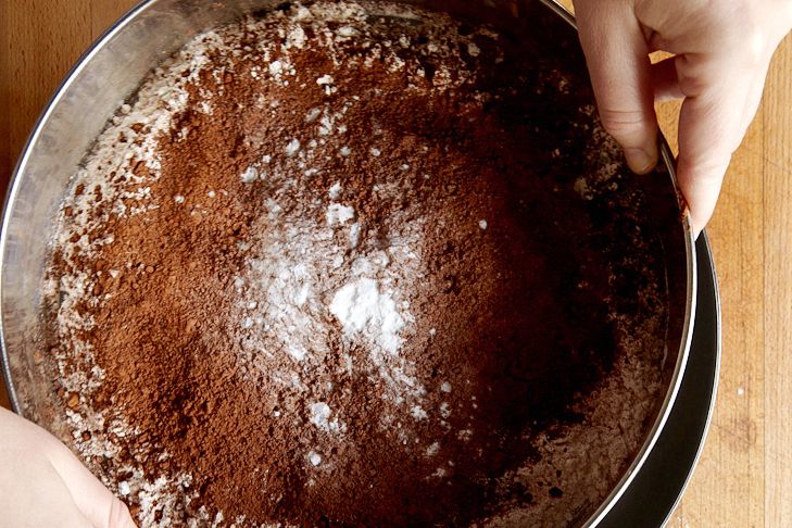 sifting dry ingredients for irish stout cupcakes