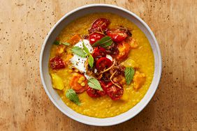golden dal with gingered tomatoes in white bowl