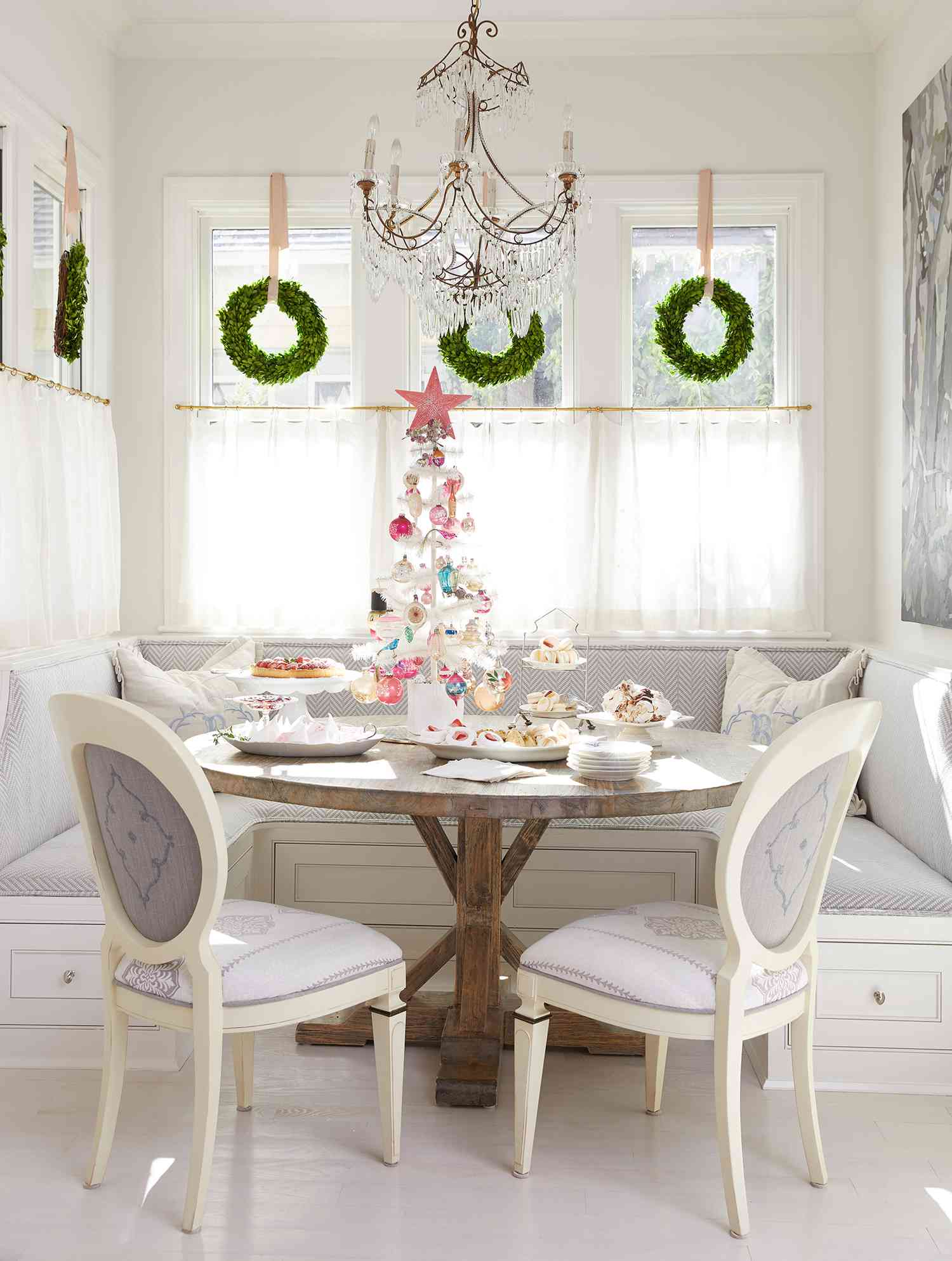 christmas wreaths in the window