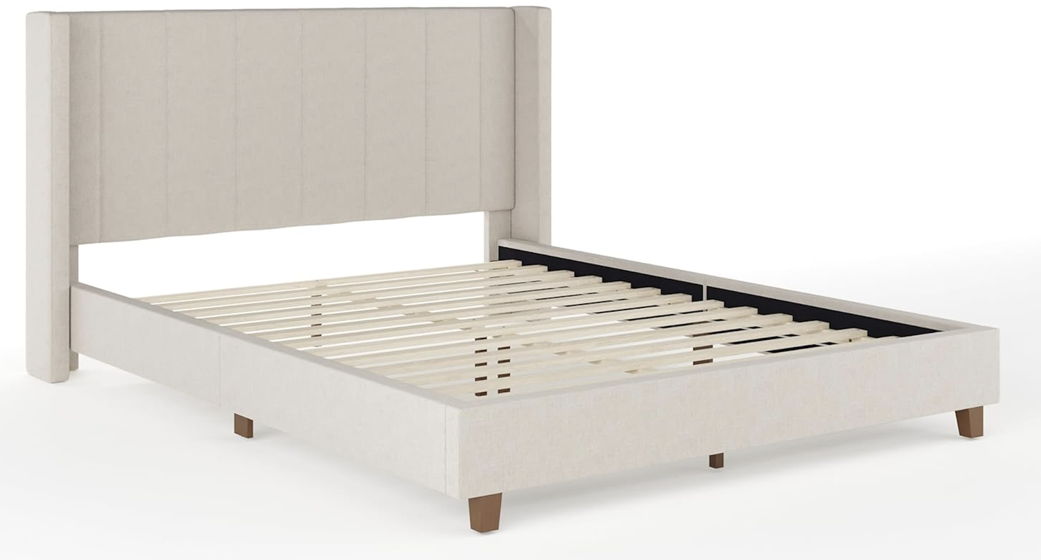 Bed frame with a fabric headboard and wooden slats