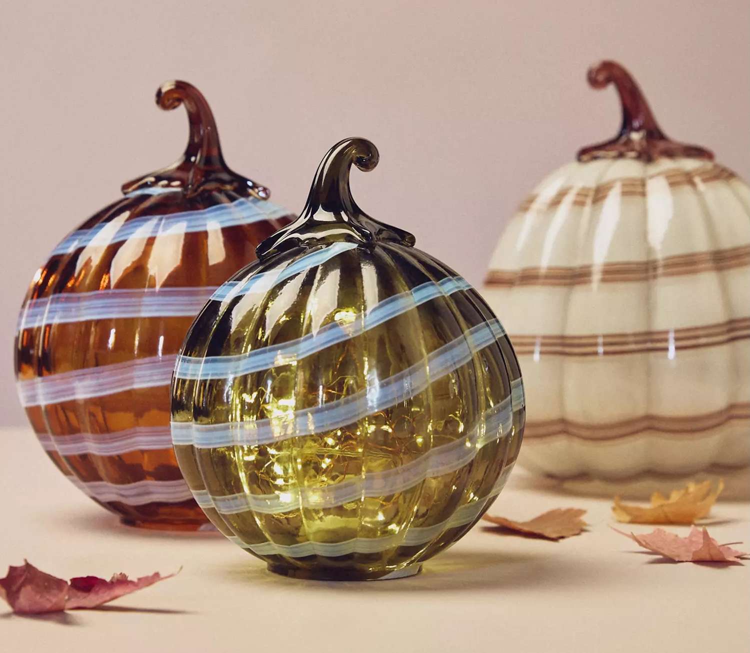 Decorative glass pumpkins with striped patterns