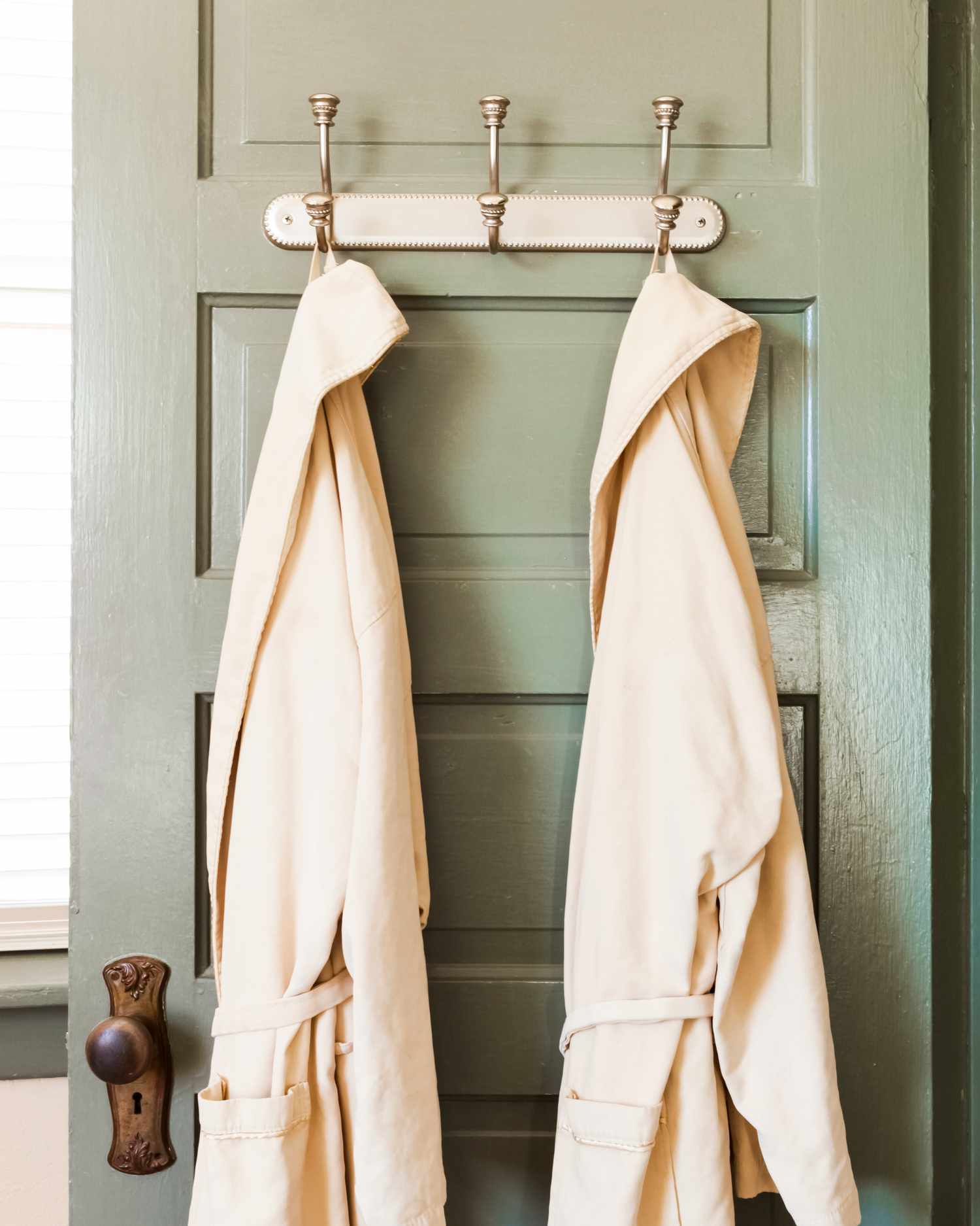 Wall hooks on bathroom door