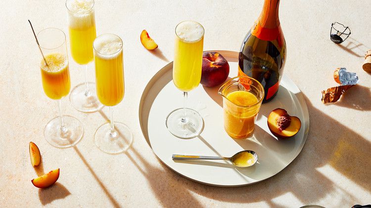 peach bellinis served in flutes