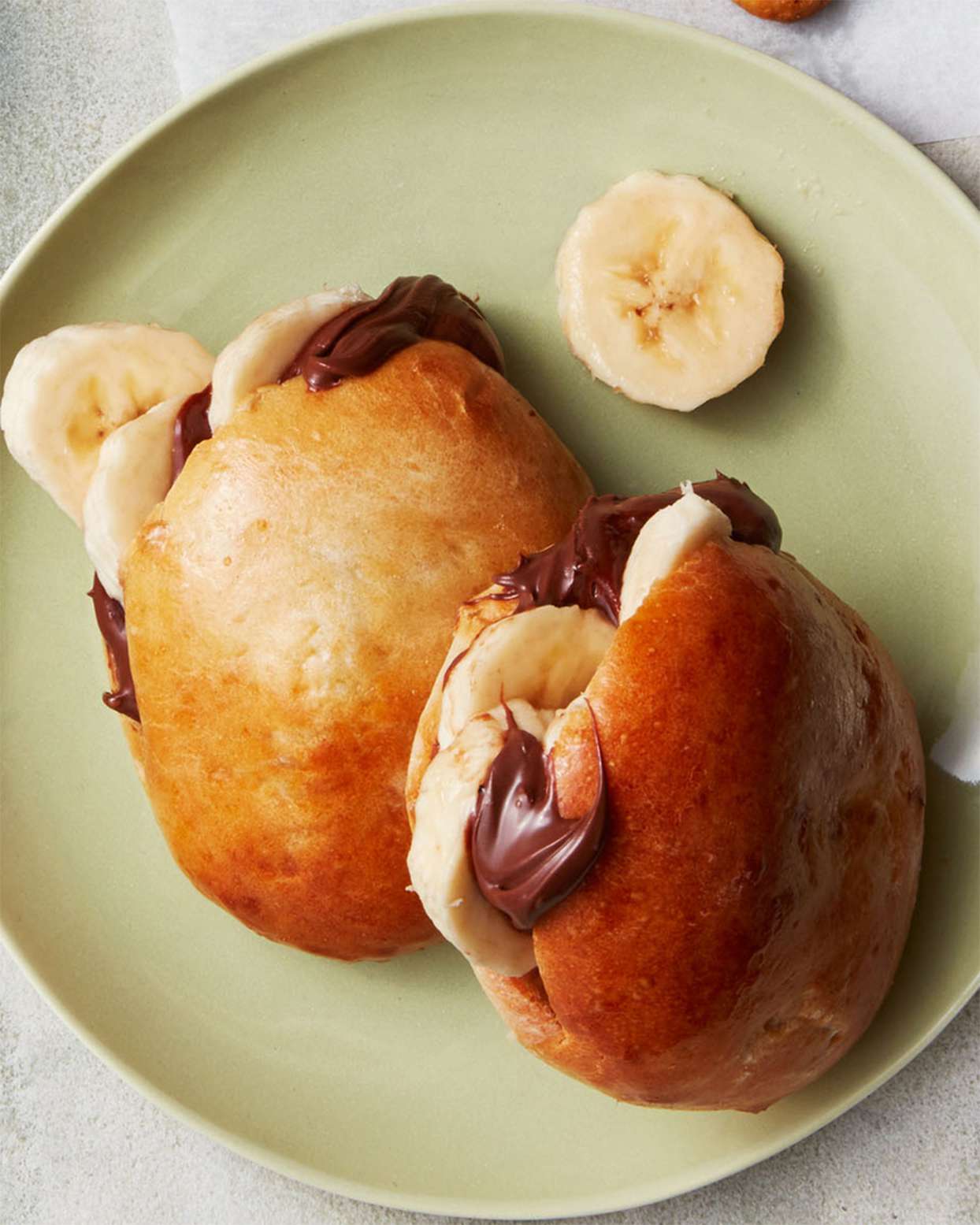 nutella and banana pockets served on a green plate