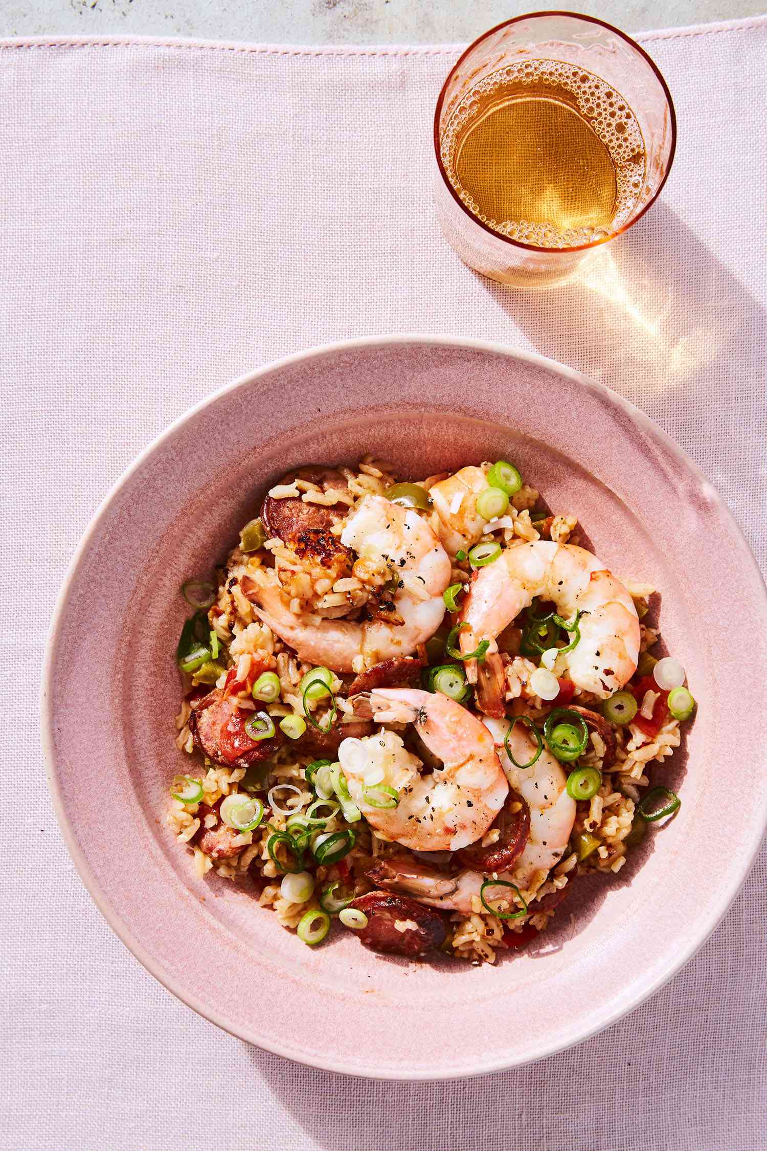cajun shrimp and rice in pink bowl