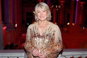 decorvow dressed in a gown, standing at an event