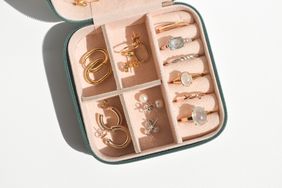 Gold and silver jewelry collection in a box. 
