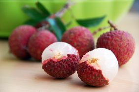 red lychee fruit on counter