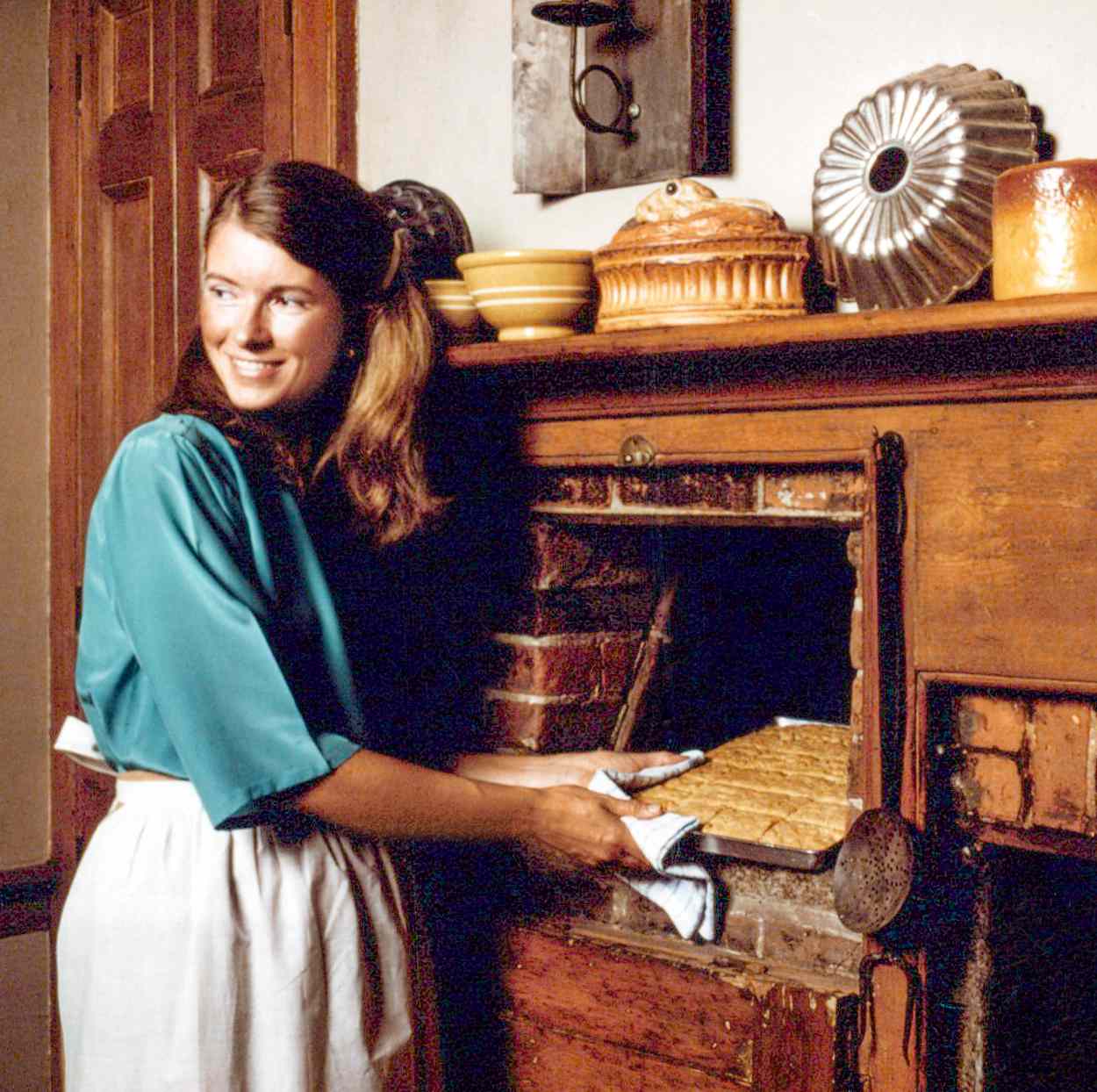 Martha at baking in beehive oven