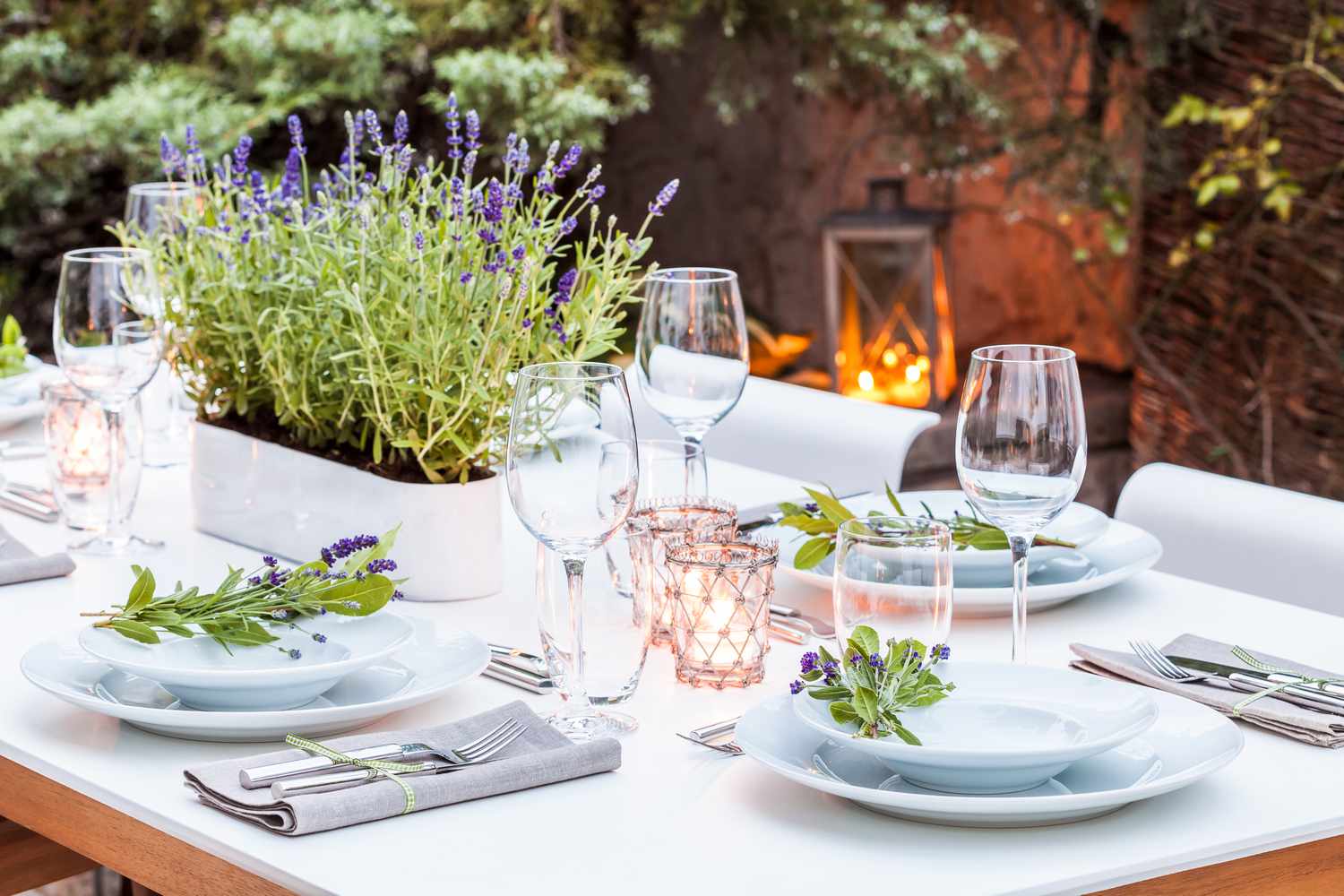 outdoor dinner table decorated with garden lavender