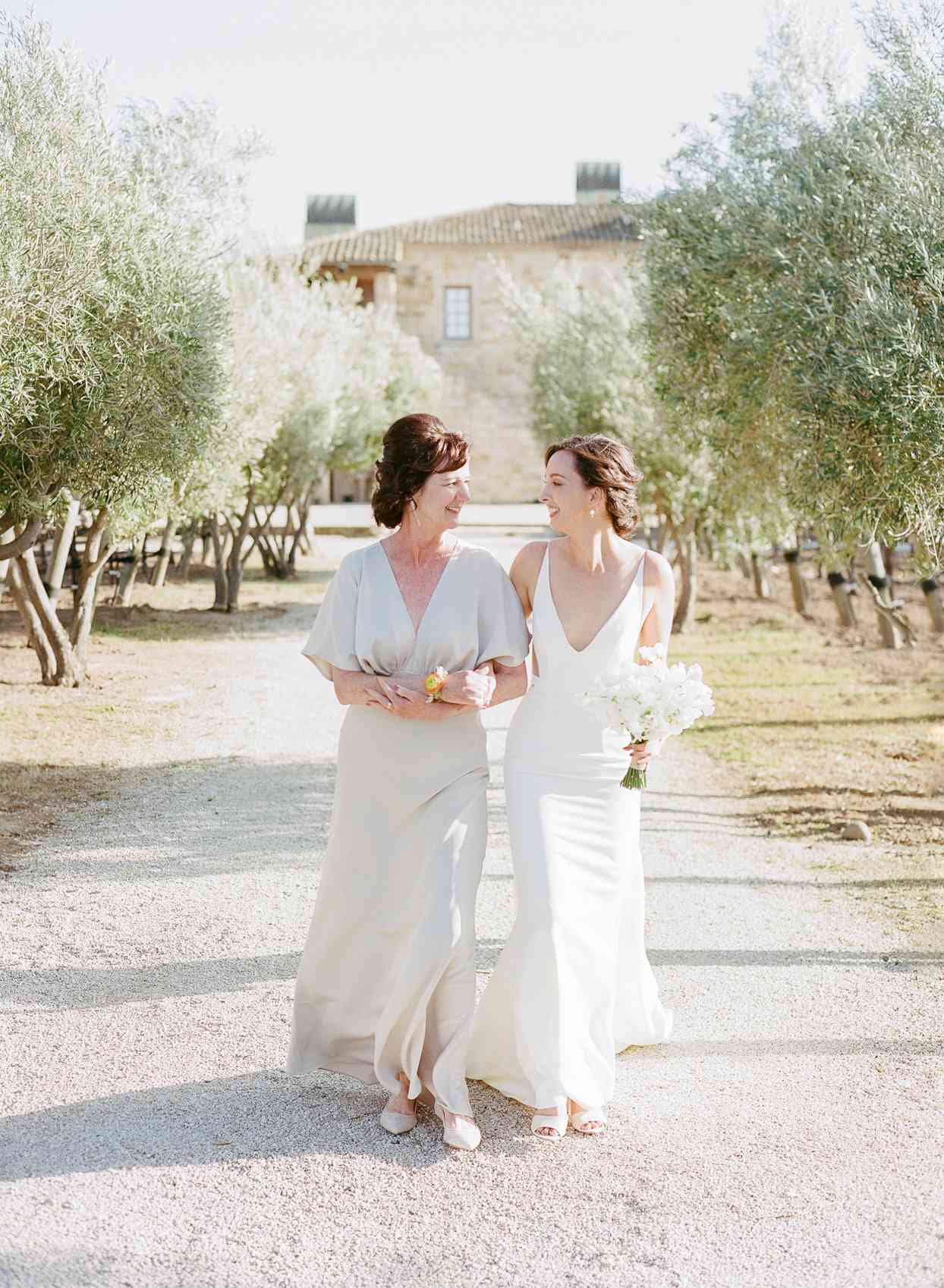 bride and mother walking