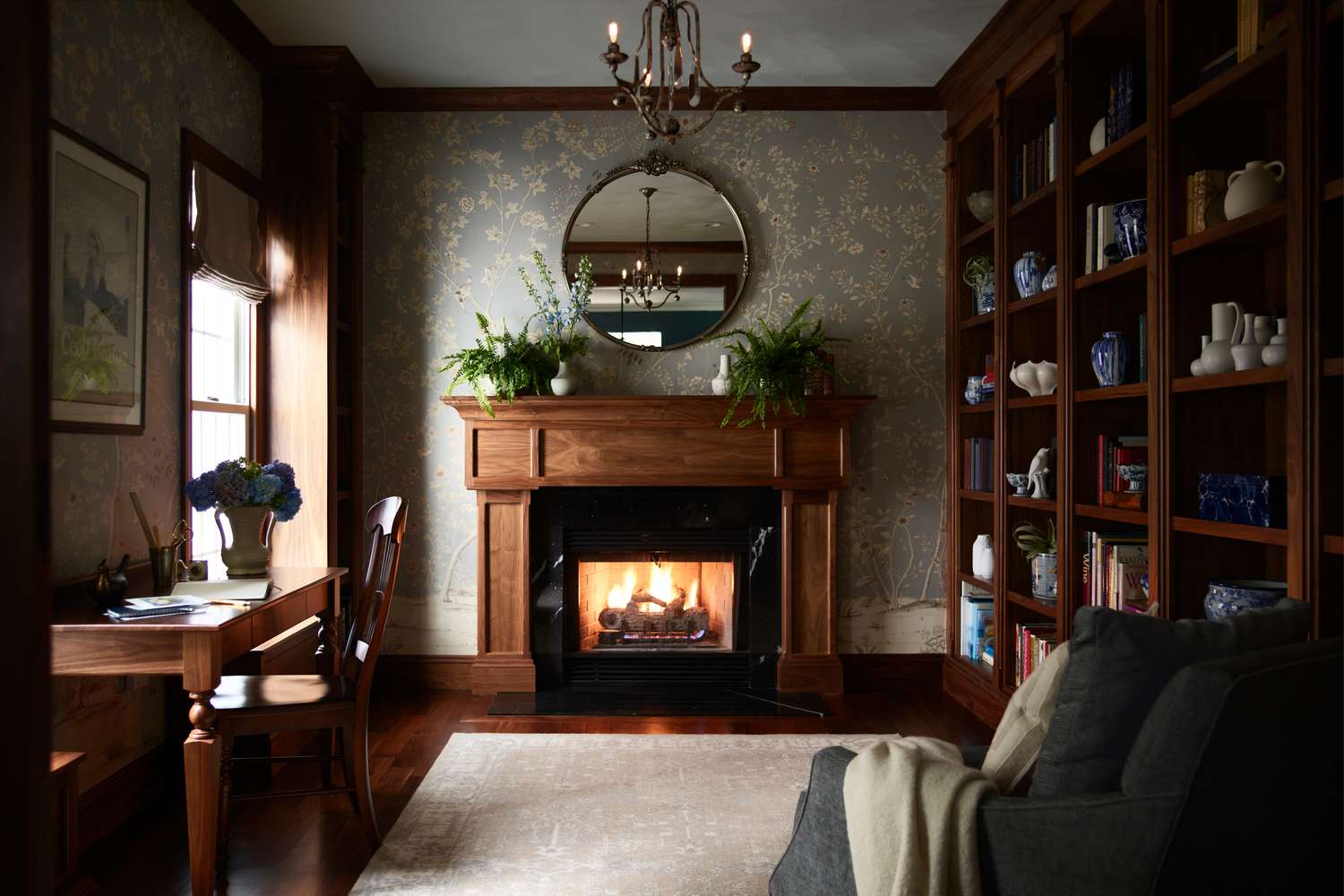 Home study fireplace with greenery on mantle