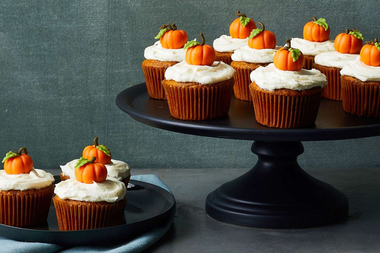 Pumpkin cupcakes on cake stand