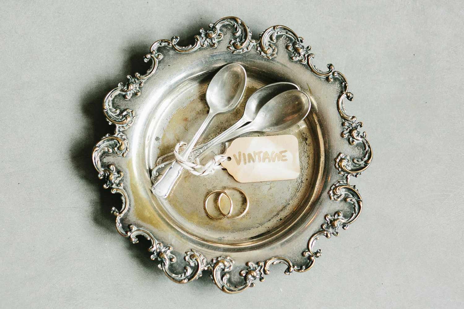 lola quinlan elopement rings antique spoons on platter