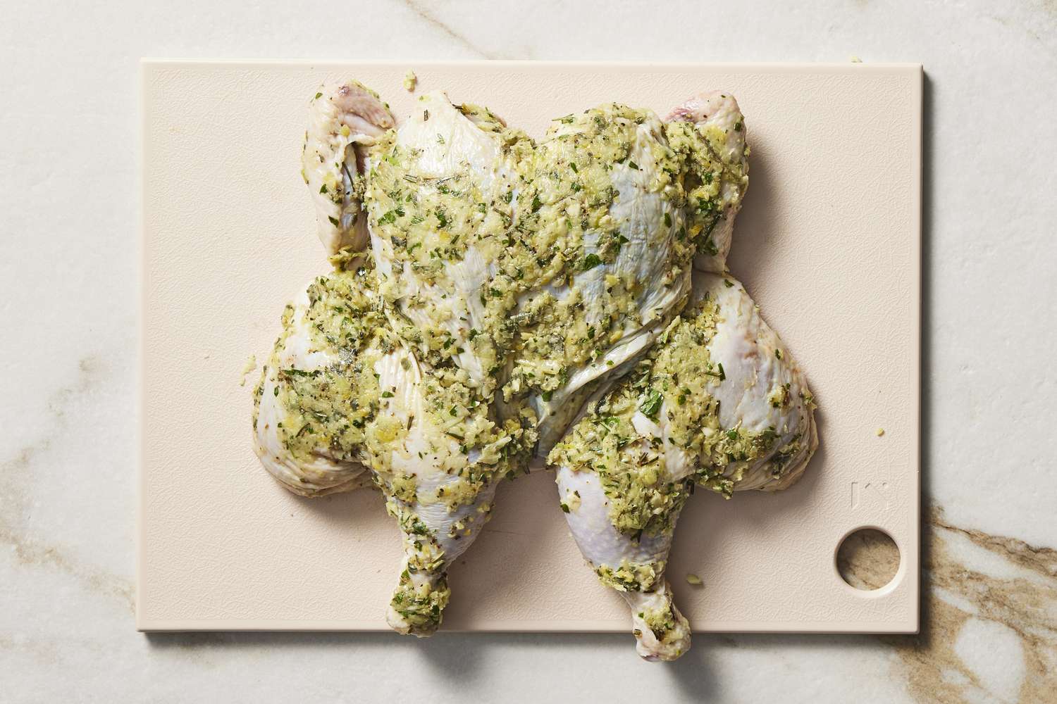 Raw rubbed chilled Grilled Spatchcocked Chicken