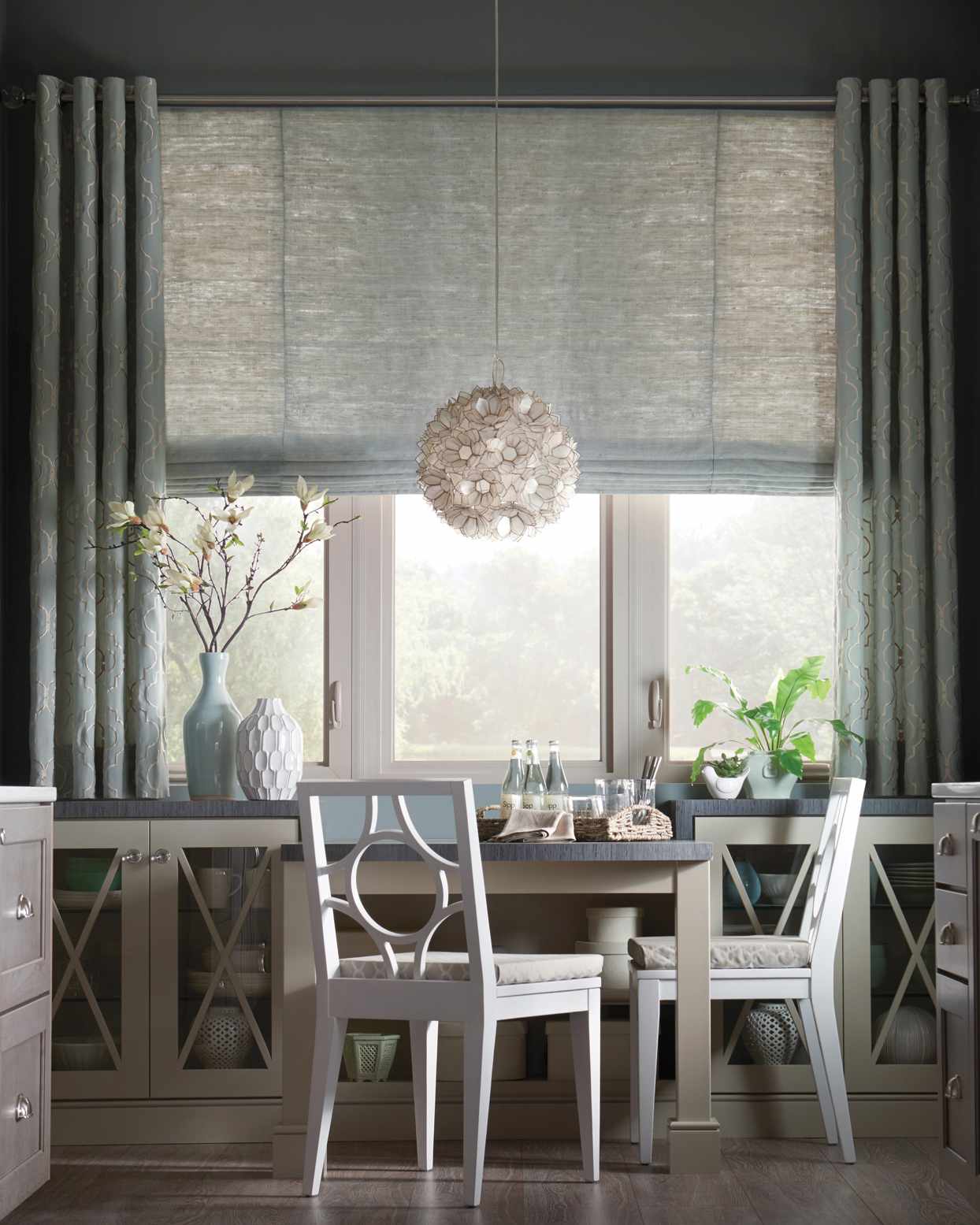 gray kitchen with roman shades