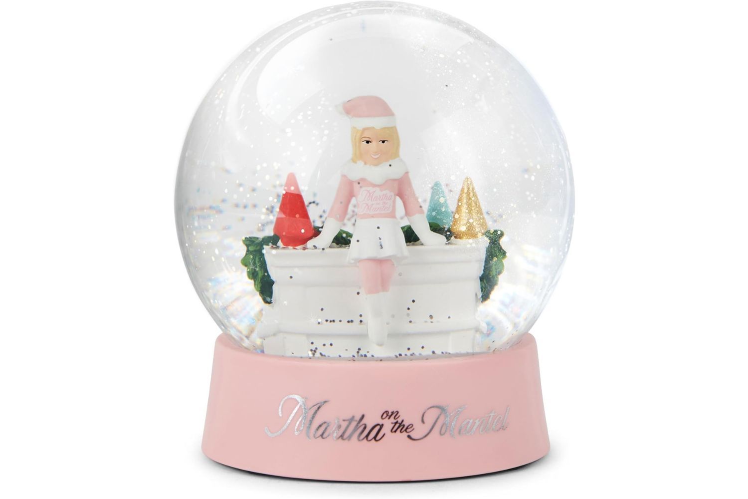 A snow globe featuring a figurine of a character in holiday themed attire seated on a mantel