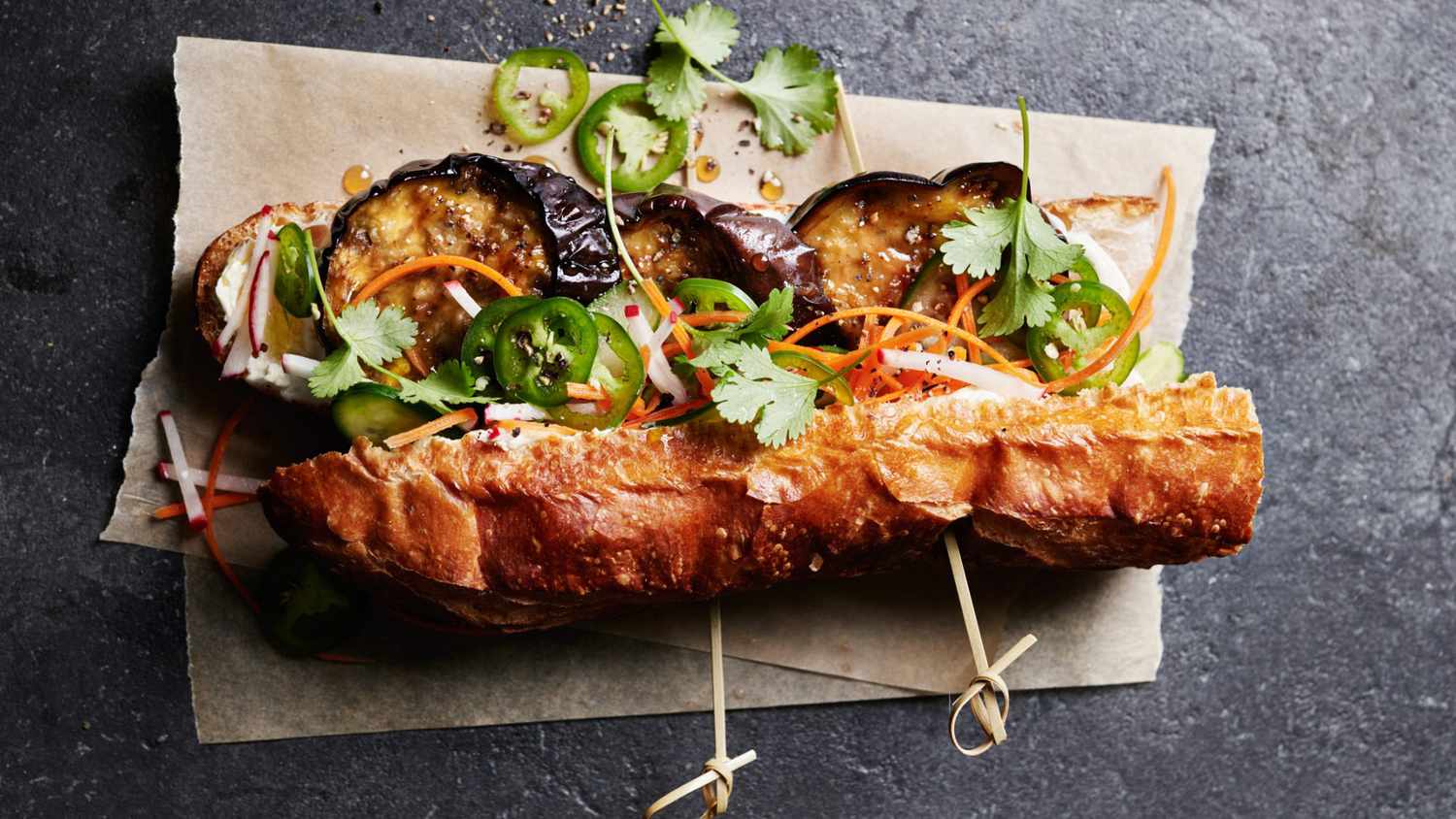 eggplant banh mi topped with cilantro