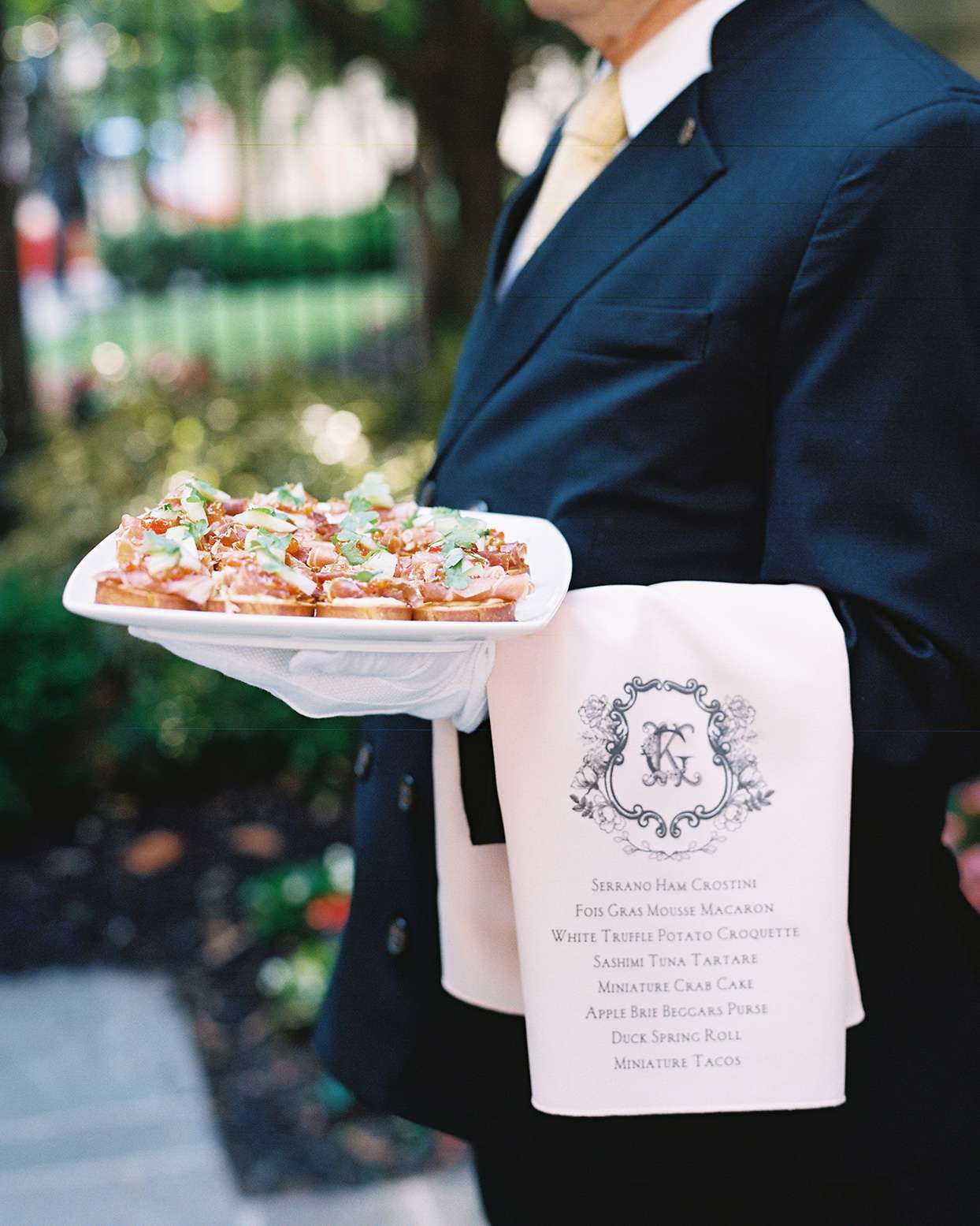 gigi kyle wedding server holding appetizers