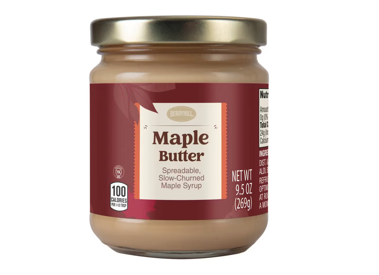 A jar of maple butter with a red label showing nutritional information and product details labeled as spreadable slowchurned maple syrup