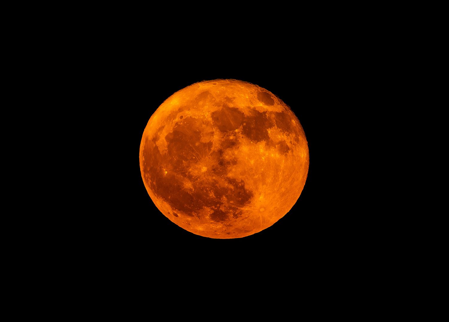 A total lunar eclipse with a reddish color
